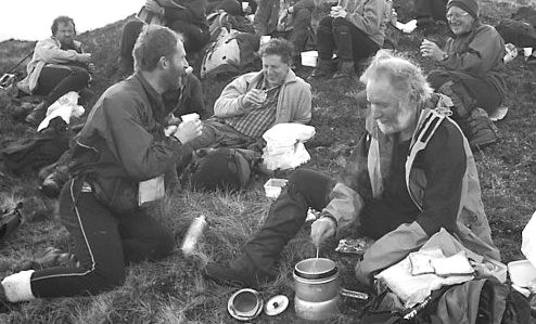 Bert Barnett celebrates 1000 Marilyns on the island of Scalpay (17C). Richard Webb, Rob Woodall, Gordon Adshead and Don Smithies look on (photo: Ann Bowker)