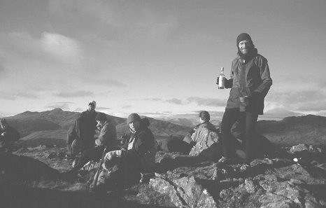 Rob Woodall celebrates his final Graham, Beinn Damhain (1D) on 26 Dec 2000 (photo: Richard Webb)