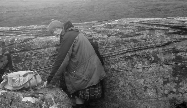 Stewart Logan entering the Dwarfie Stane, Hoy (photo: Brent Lynam)