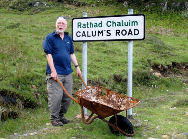 Chris Watson trying to nick Calum's wheelbarrow (photo: Douglas Law)
