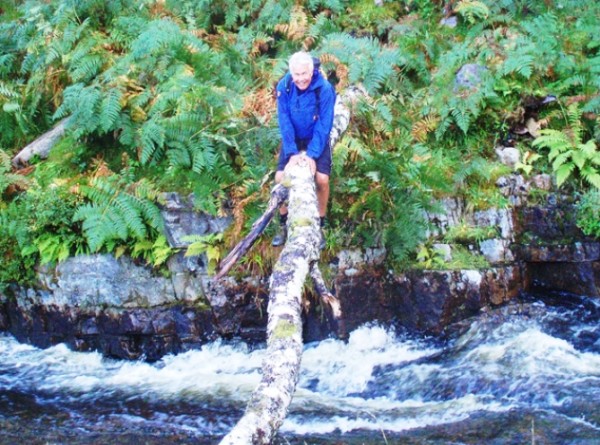 Tony Deall playing Indiana Jones near Corrie Hallie