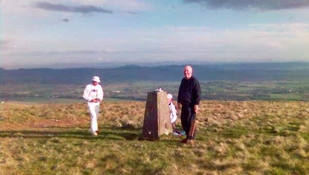 Tony Watson batting on Lendrick Hill, with Alan Dawson bowling, Dave Hewitt keeping (photo: Anne-Marie Watson)